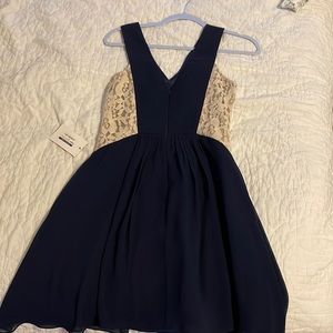 Navy and cream lace dress.